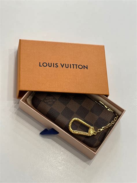 Louis Vuitton pochette con catena – icons luxury vintage